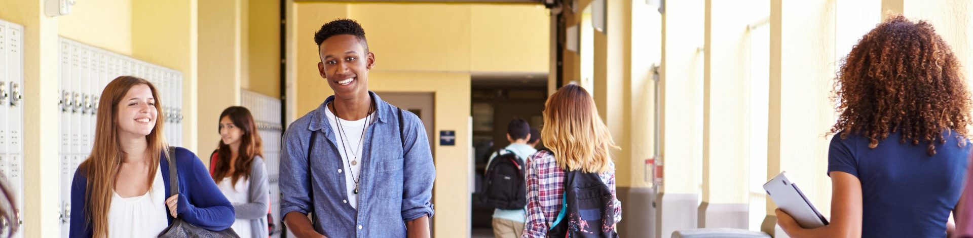 Young people in a school hallway